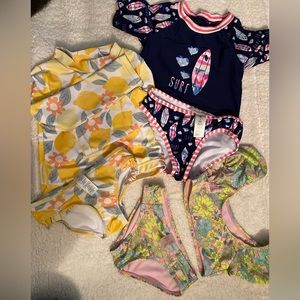3 almost new swimsuits. Various brands. NO PILLING stains or tears.